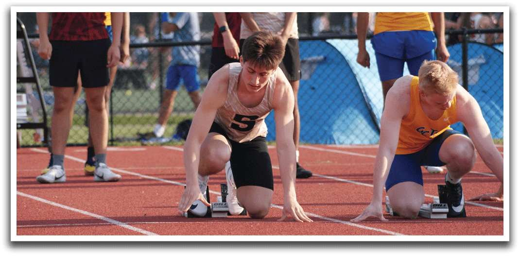 A group of people are lined up on a track, with one person bent over in front of the others. Contenido generado con IA