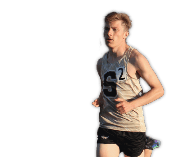 A man is running on a track, wearing a white shirt and black shorts. Contenido generado con IA
