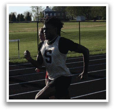 A group of people are running on a track. Contenido generado con IA