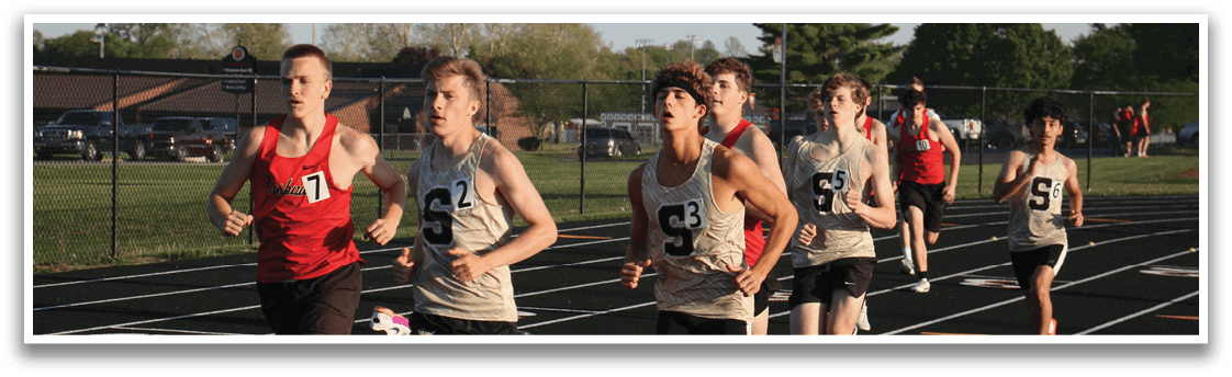 A group of young men are running on a track, wearing uniforms and racing against each other. Contenido generado con IA