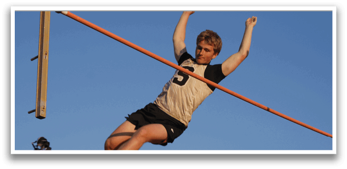 A man is jumping in the air to catch a pole. Contenido generado con IA
