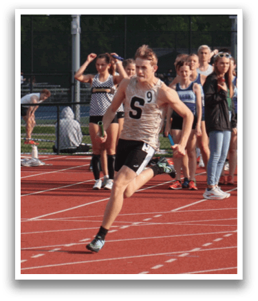 A group of people are running on a track, with one person leading the pack. Contenido generado con IA