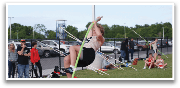 A man is jumping in the air to catch a pole. Contenido generado con IA