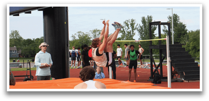 A woman is performing a gymnastics trick on a bar. Contenido generado con IA