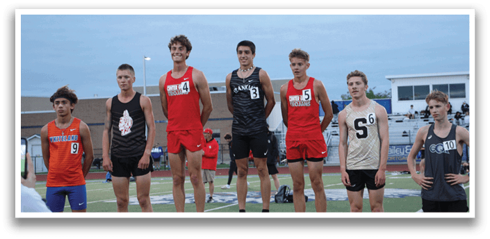 A group of young men stand on a podium, wearing athletic uniforms and holding trophies. Contenido generado con IA