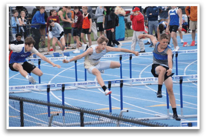 A group of young men are running a race, jumping over hurdles. Contenido generado con IA