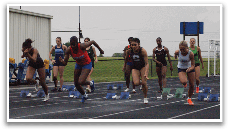 A group of women are running on a track, with some of them wearing shorts. Contenido generado con IA