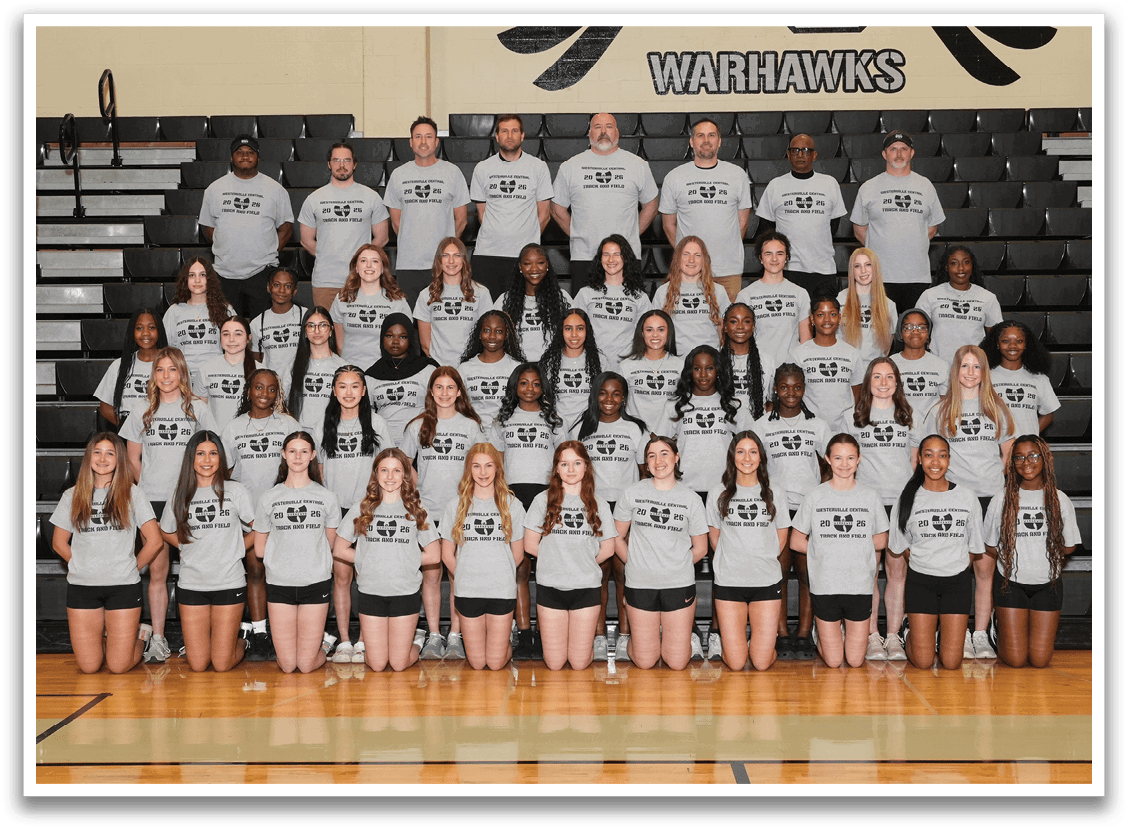 A group of people wearing gray shirts. Description generated by AI