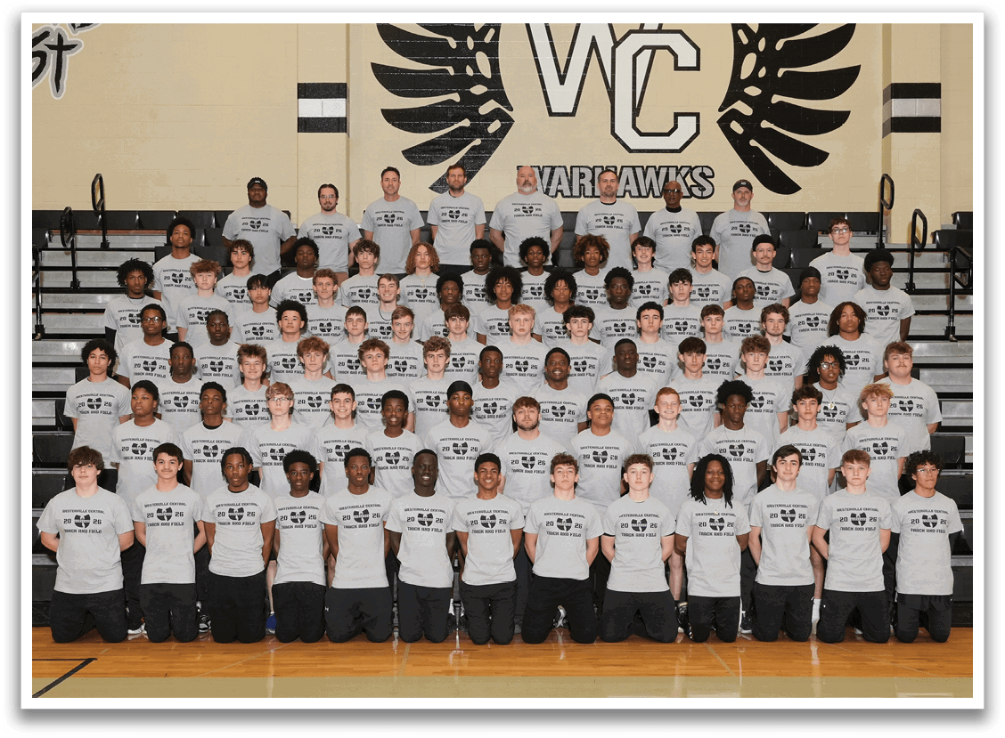 A group of people wearing grey shirts. Description generated by AI