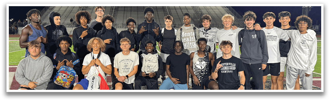 A man running on a track. Description generated by AI