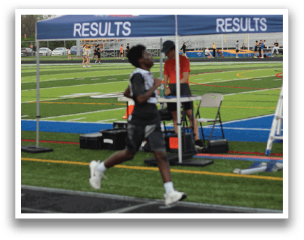 A blue and white tent with the word results on it. Description generated by AI