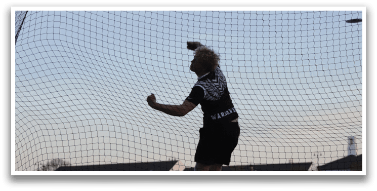 A person is throwing a baseball. Description generated by AI