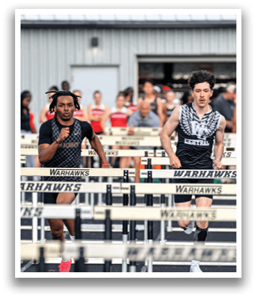 A group of people are running on a track. Description generated by AI