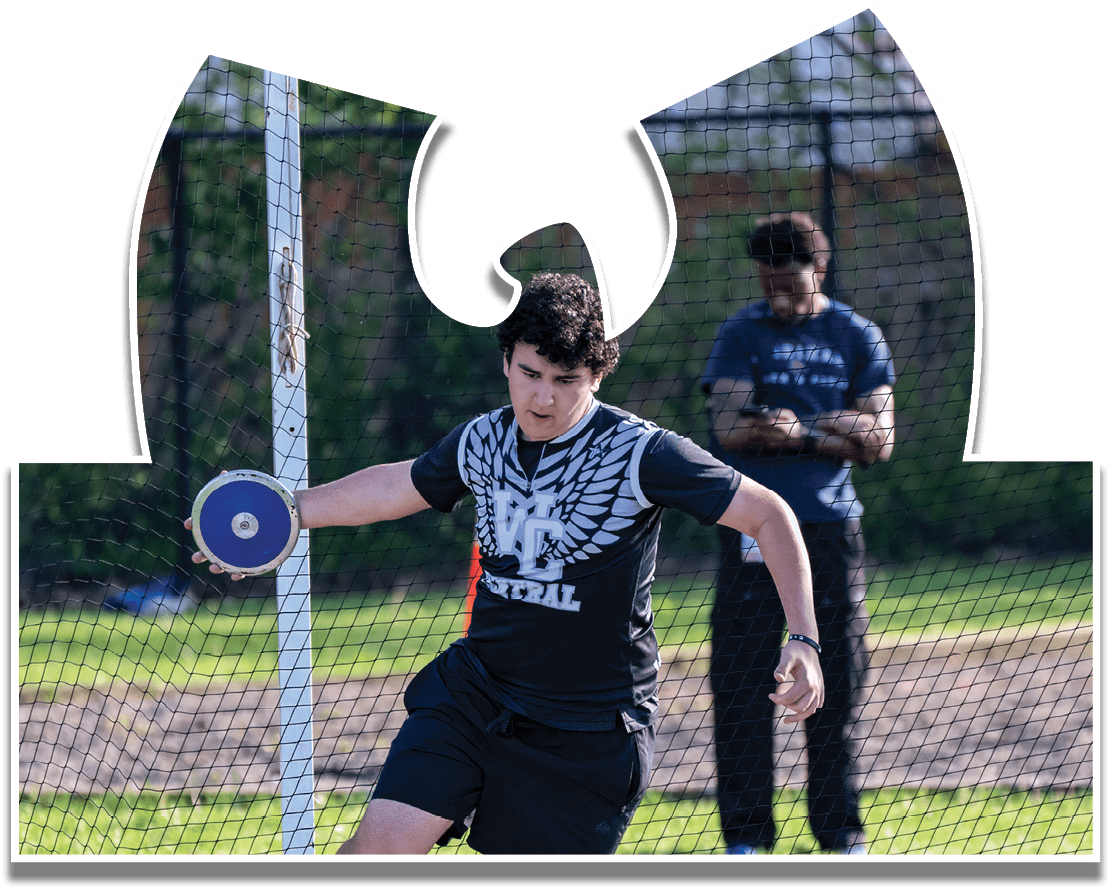 A man is throwing a disc in a field. Description generated by AI