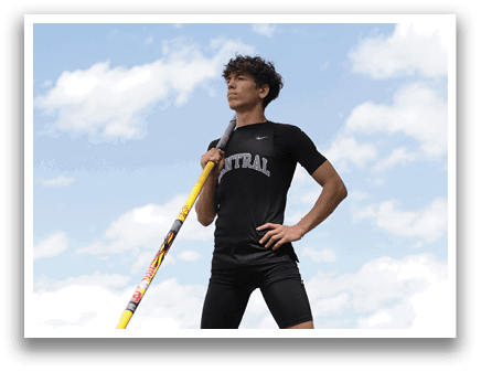 A man holding a pole. Description generated by AI
