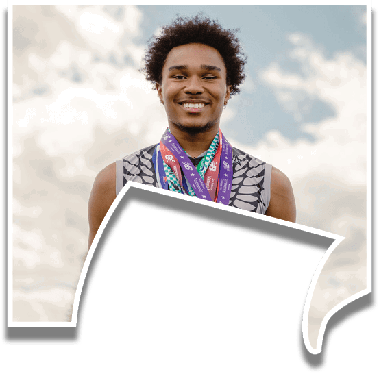 A man wearing a black shirt and gold medals. Description generated by AI