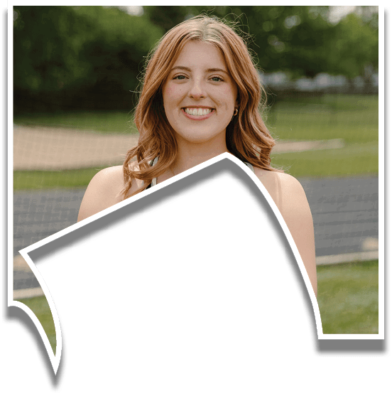 A woman wearing a black tank top with the word “Western" on it. Description generated by AI
