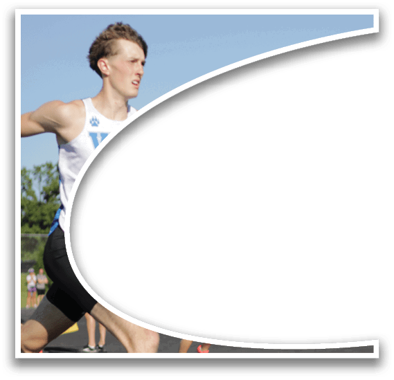 A runner in a white shirt and black shorts is running on a track. Description generated by AI