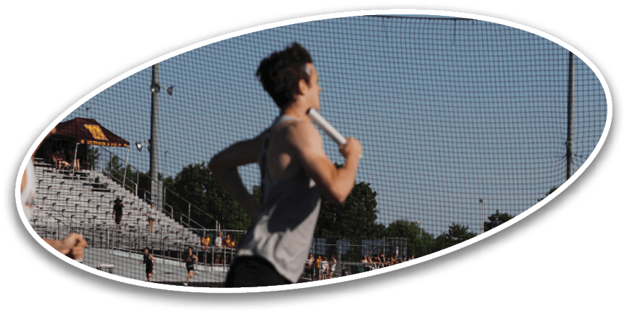 A man running on a track. Description generated by AI