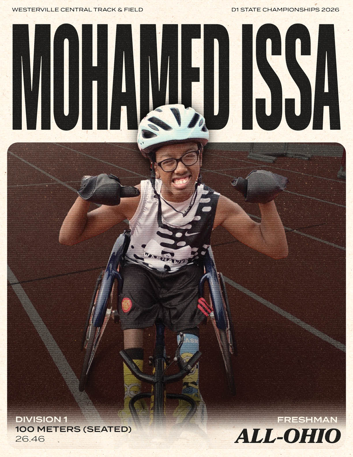A young man in a wheelchair is smiling and holding his arms up. Description generated by AI