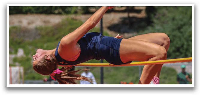 A woman is jumping in the air. Description generated by AI