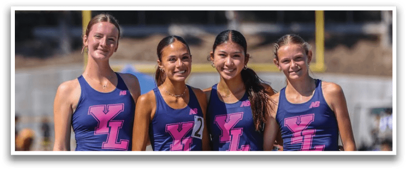 Three women wearing blue and pink sports outfits. Description generated by AI