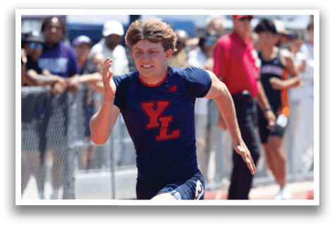 A man running on a track. Description generated by AI