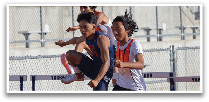 Two men are running on a track, one of them is jumping over a hurdle. AI generated content
