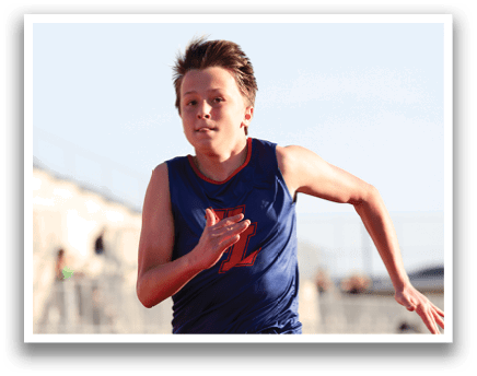 A young man is running on a track, wearing a blue and red shirt. AI generated content