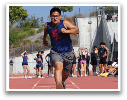 A man is running on a track with a cone in front of him. AI generated content