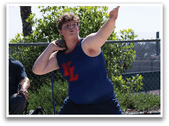 A man wearing a blue shirt and shorts is throwing a baseball. AI generated content