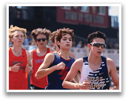 A group of runners on a track. Description generated by AI