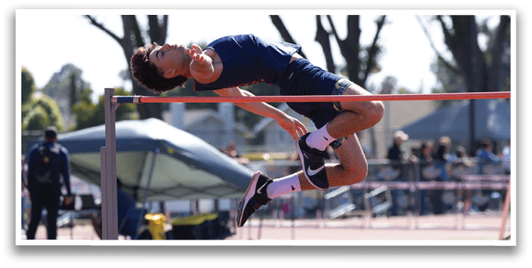 A man is jumping over a red pole. Description generated by AI