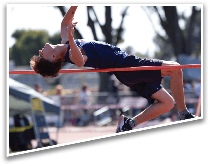 A man jumping over a red pole. Description generated by AI