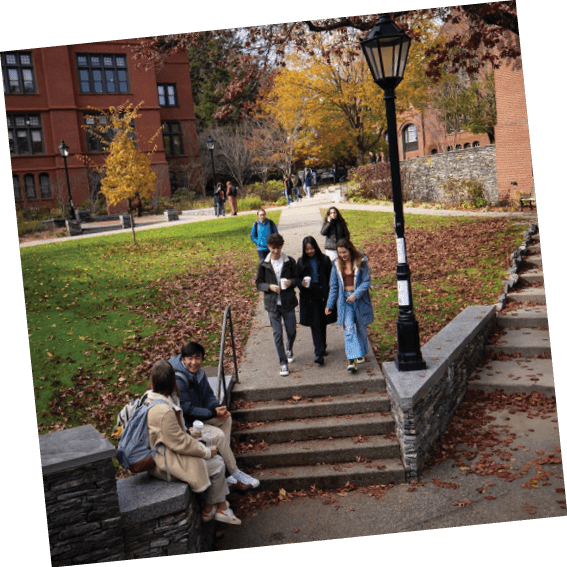 A group of people are walking on a sidewalk near a building. AI generated content
