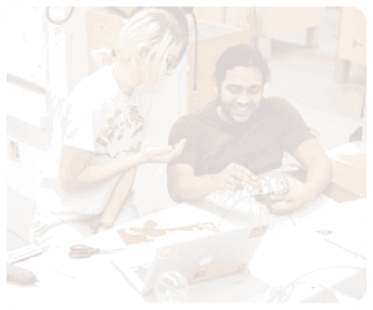 A man and a woman are working on a project together. The man is holding a kite while the woman is pointing at something. They are both smiling and appear to be enjoying the activity. AI generated content