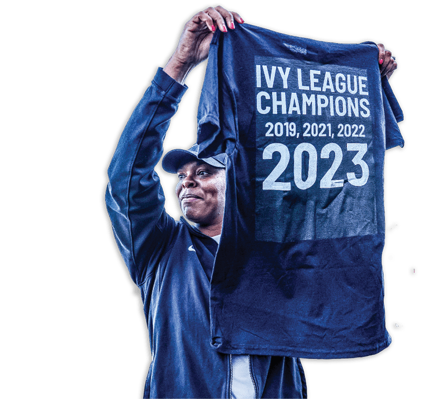 A person wearing a black shirt with the words “Ivy League Champions 2023" on it. AI generated content
