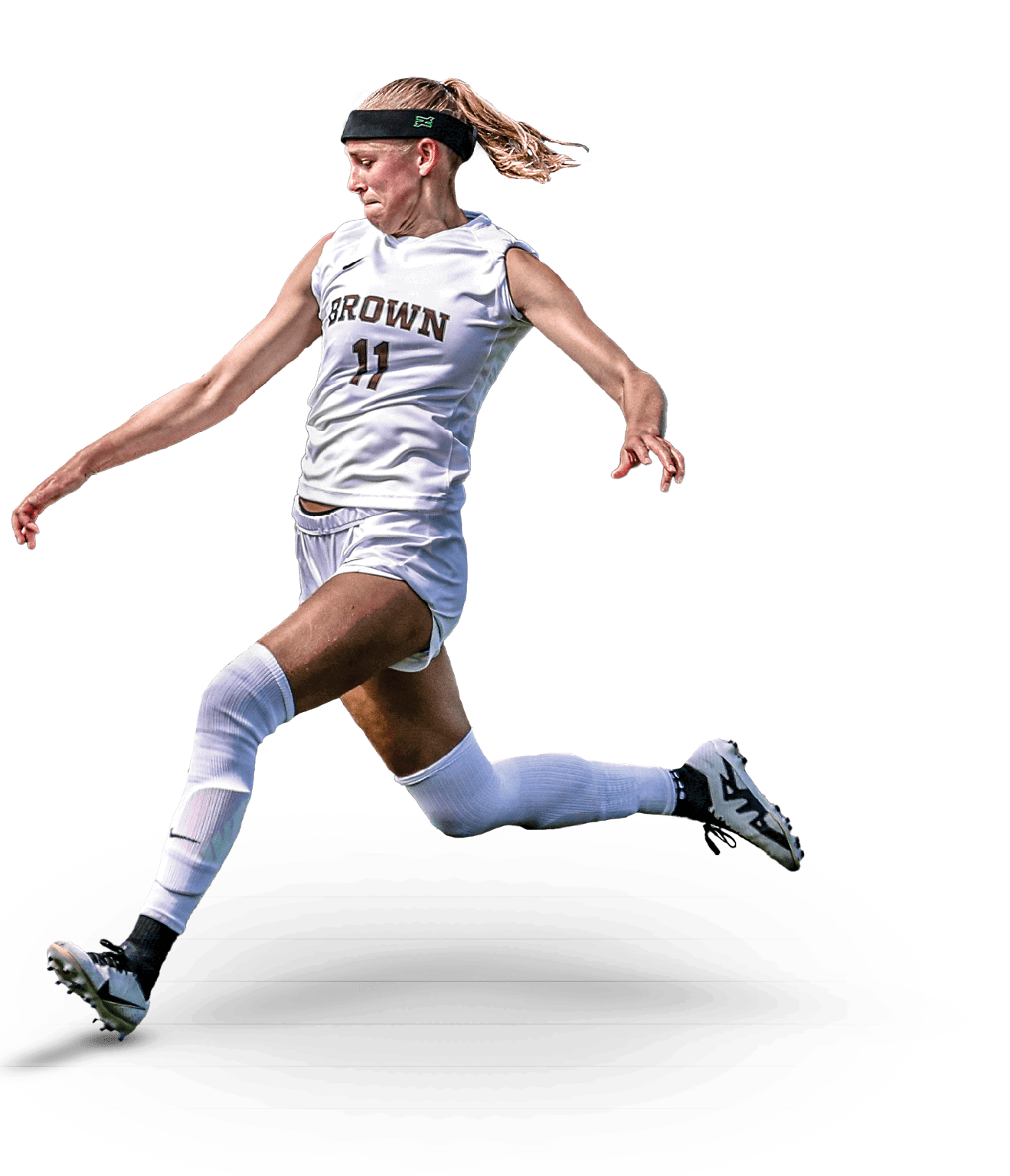A woman in a white uniform is playing soccer, kicking a ball. AI generated content