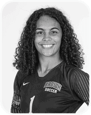 A woman wearing a soccer jersey with the number 1 on it. AI generated content