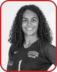 A woman wearing a soccer jersey with the number 1 on it. AI generated content
