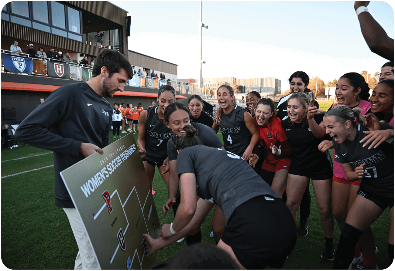 A group of women are gathered around a man holding a sign. AI generated content