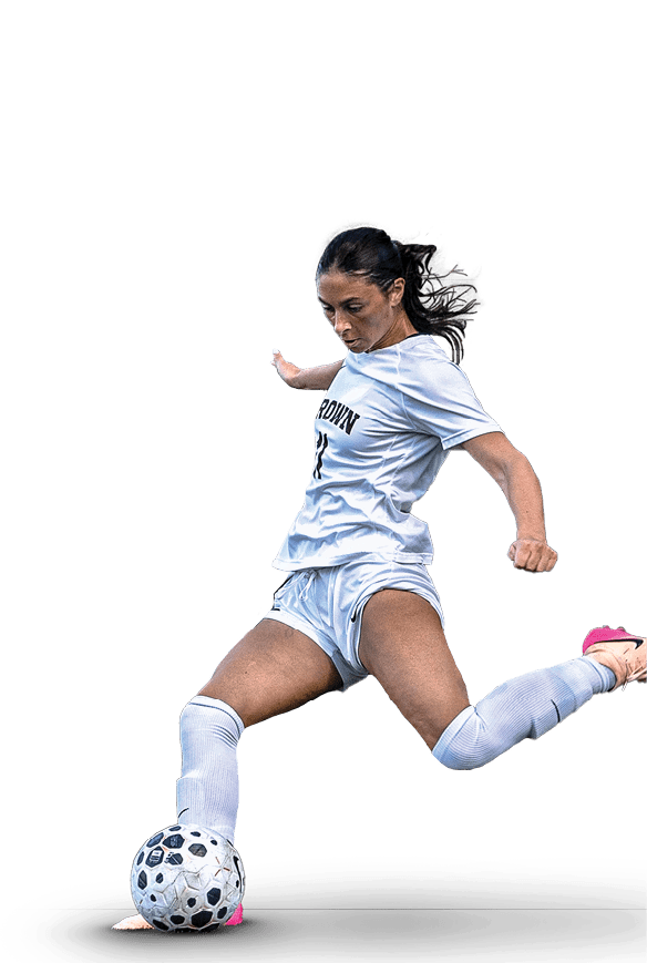 A woman is playing soccer, kicking a ball on a field. AI generated content