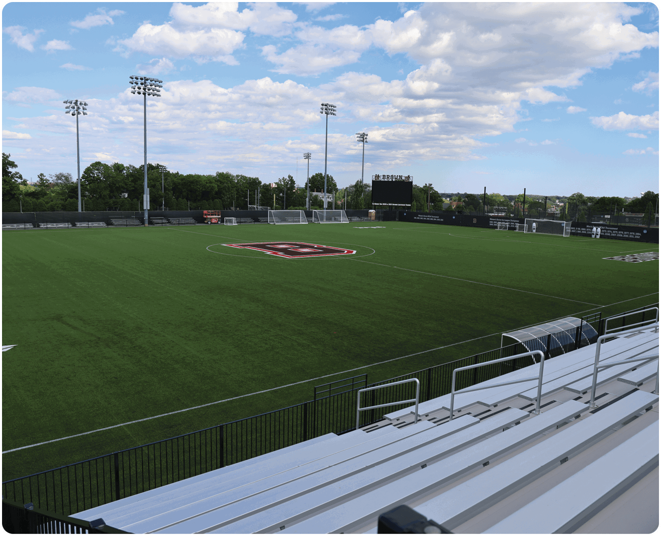 A soccer field with a white line down the middle. AI generated content