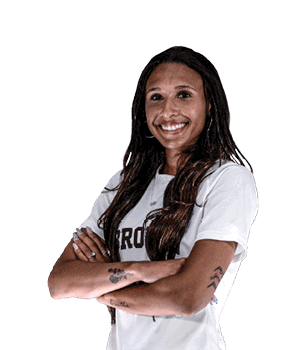 A woman wearing a white shirt and shorts is posing for a picture. AI generated content