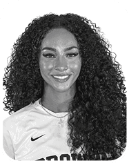 A woman wearing a white and brown jersey with the number 7 on it. AI generated content