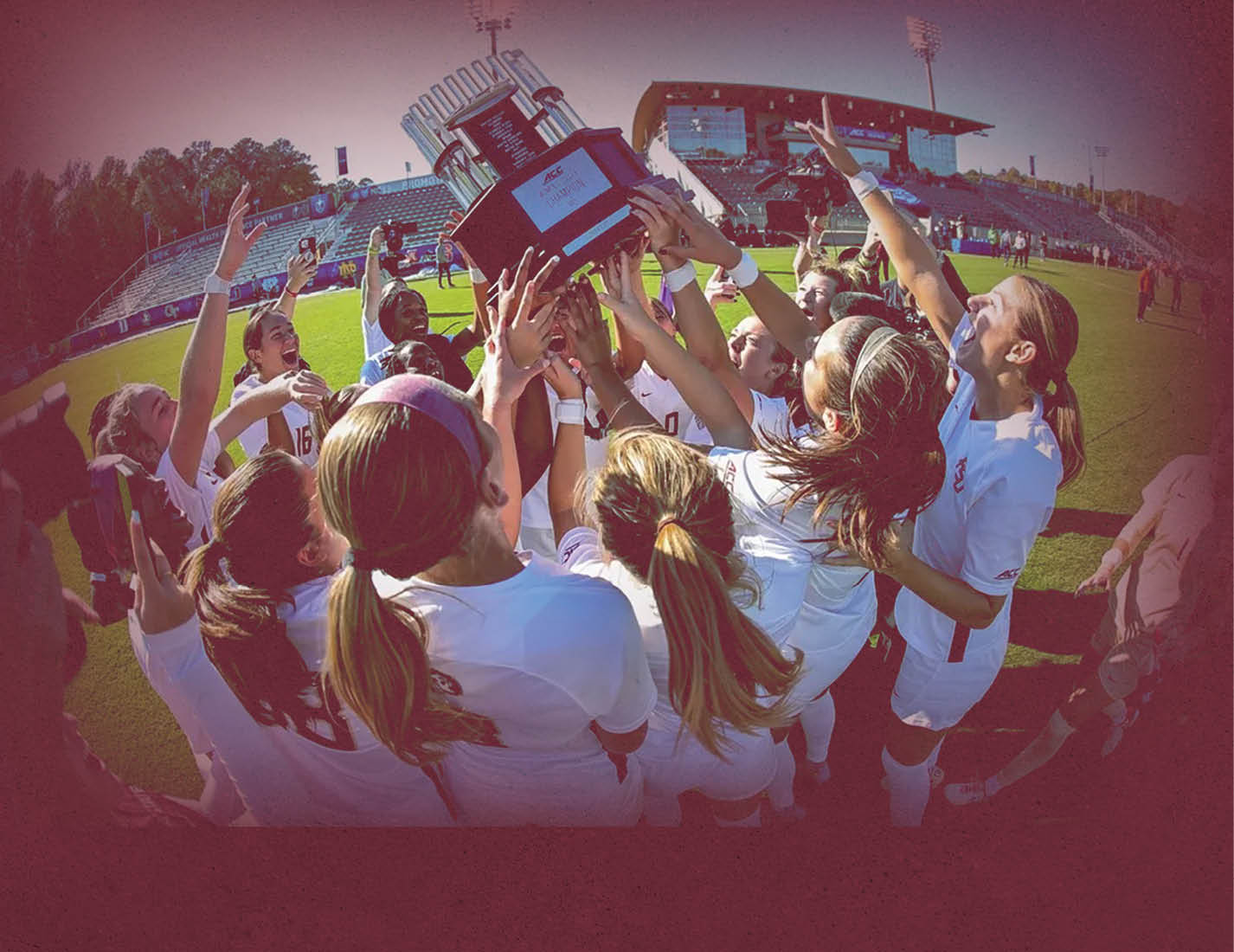A group of women are holding a trophy together. AI generated content