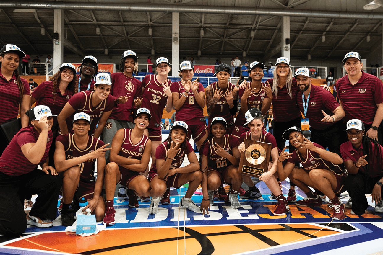 Two female basketball players on a court, one with a basketball in her hand and the other trying to block her. AI generated content