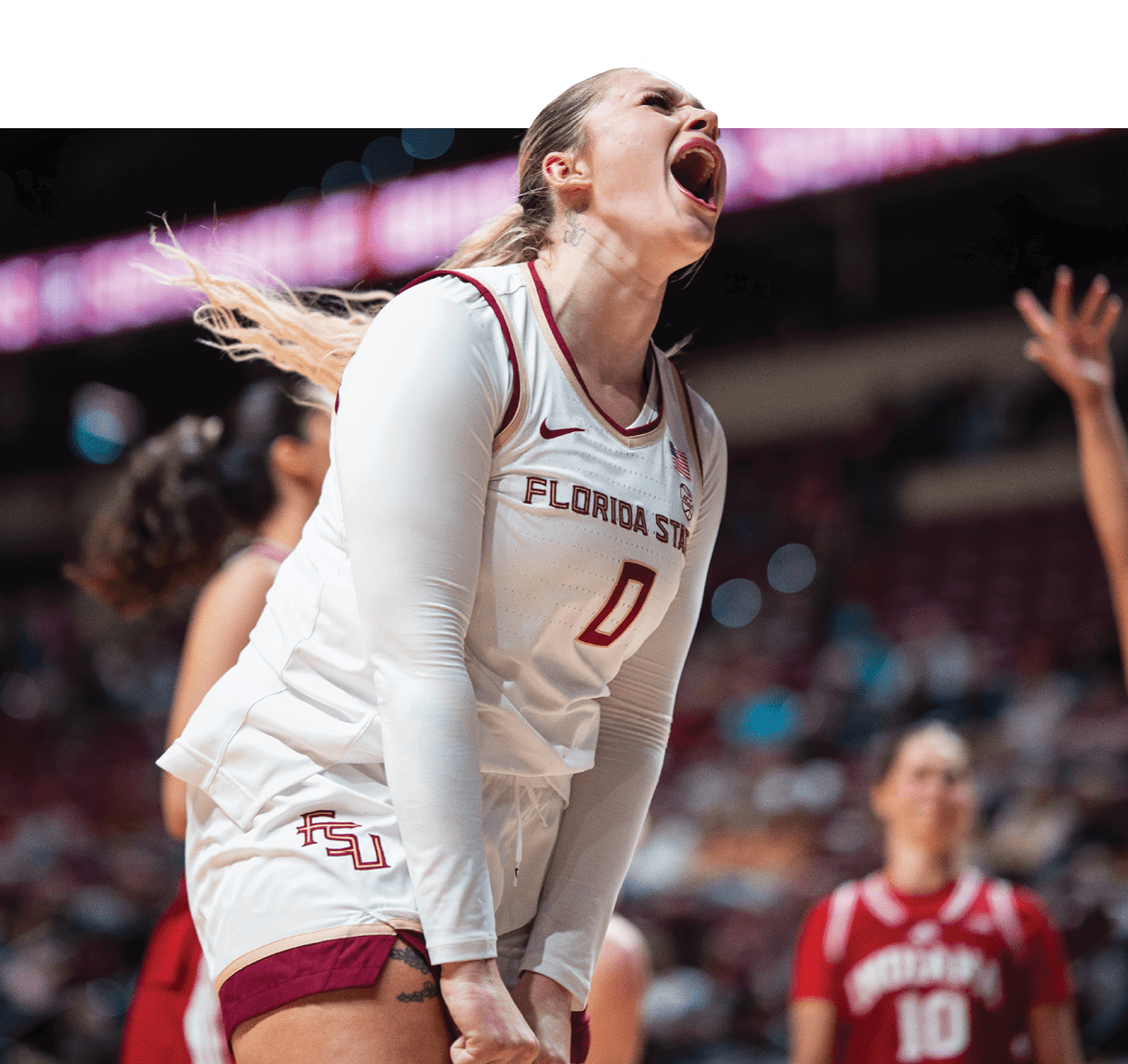 A female athlete wearing a white uniform with the number 17 on it, is yelling and pointing at the ground. AI generated content