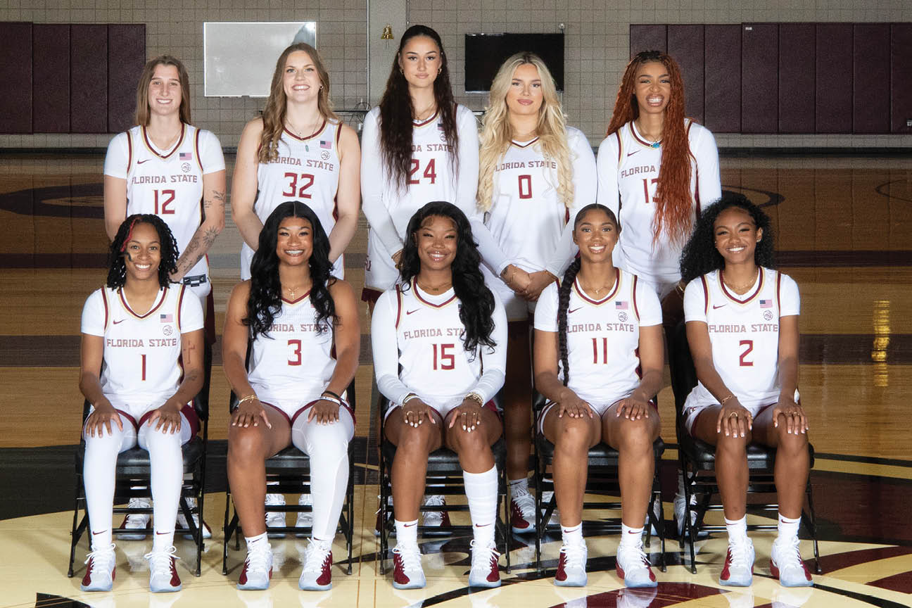 A group of women in uniform pose for a picture. AI generated content