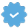 A blue and white checkmark. Description generated by AI